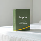 Fairpeak mattress protector package on bed